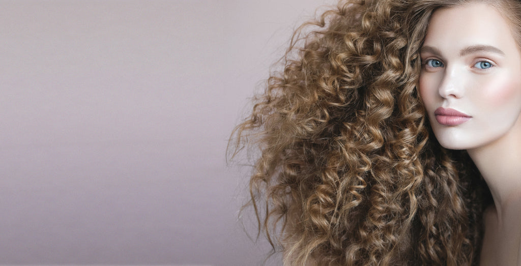 5 Curly Hair Hacks: How to get curls defined and full of bounce.